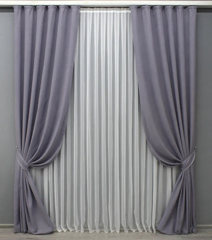 Luxury muted purple-gray velvet curtains with a smooth texture, ideal for stylish bedrooms and living rooms.
