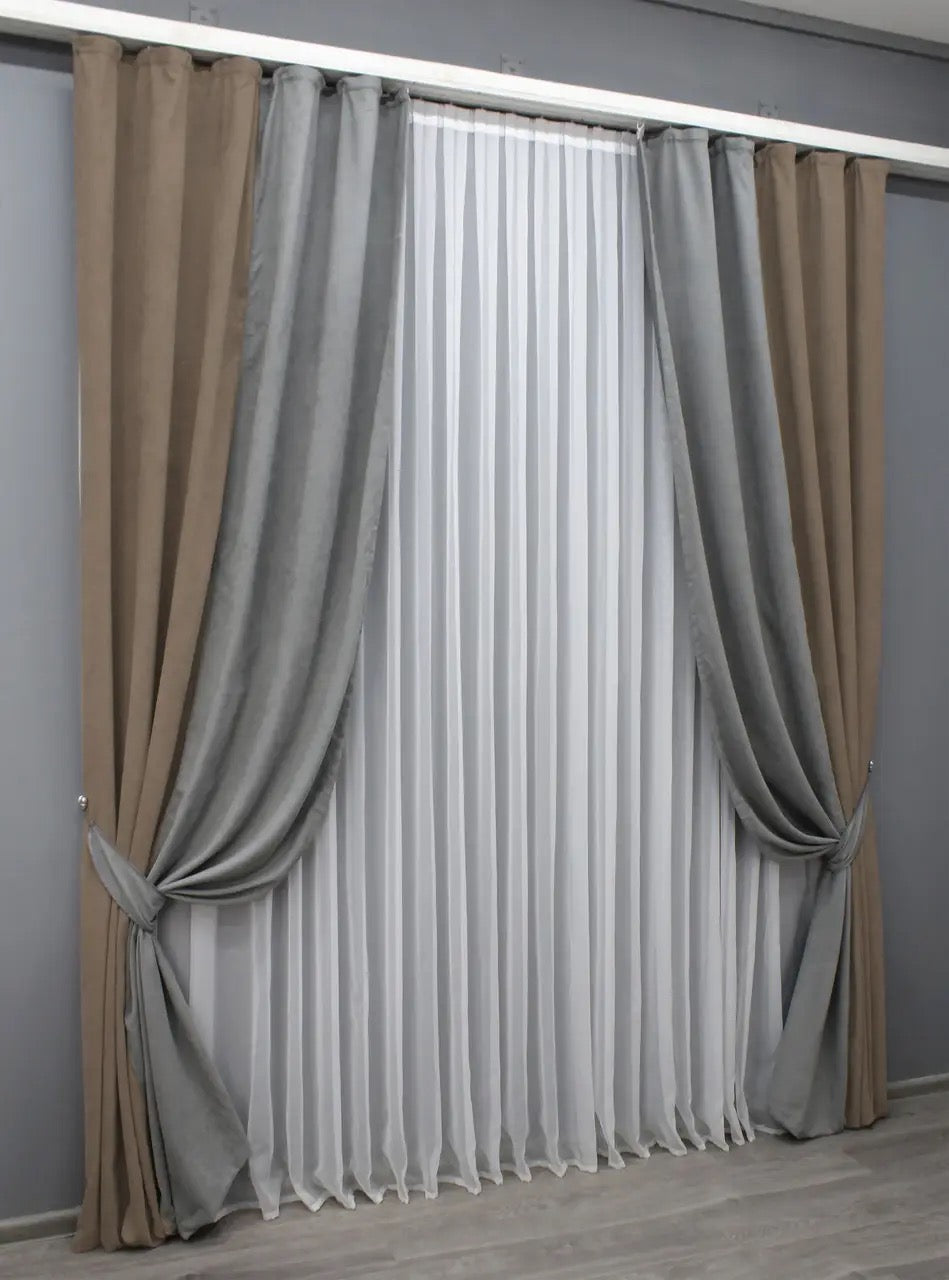 Elegant light cocoa and grey microvelvet curtains with a sophisticated two-tone design, ideal for creating a cozy and stylish ambiance in any room.
