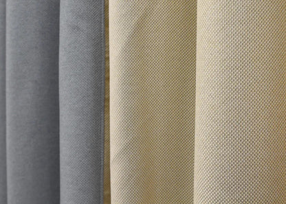 Timeless light grey and beige linen blackout curtains, ideal for enhancing both contemporary and classic interiors with a natural feel.
