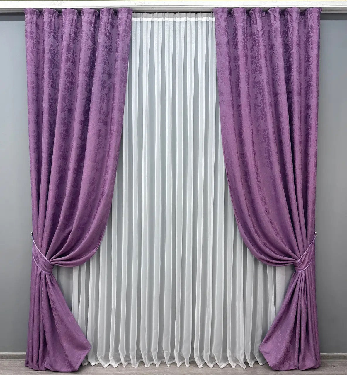 Luxury lilac jacquard curtains featuring a textured design, enhancing living rooms and bedrooms with timeless elegance.
