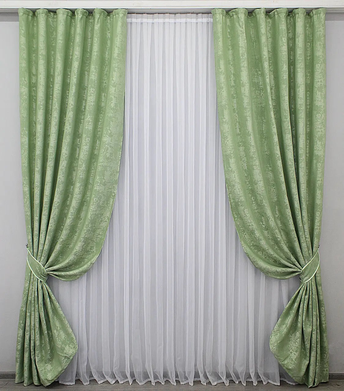 Luxury mint jacquard curtains featuring a soft, soothing tone, bringing serenity to living rooms and bedrooms.
