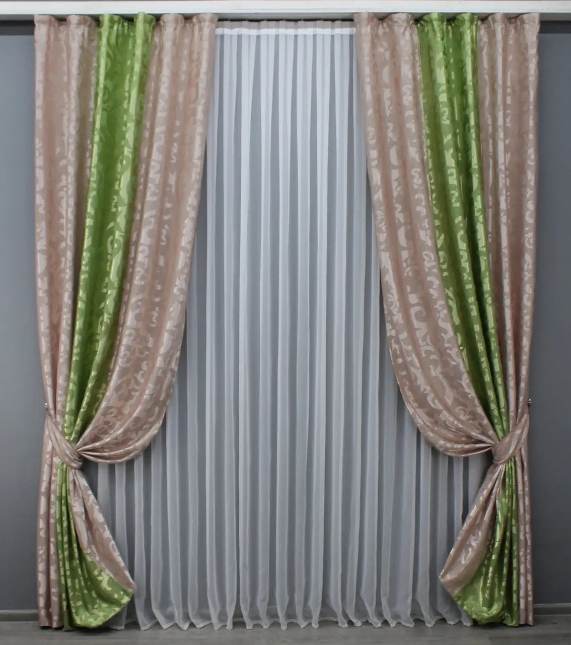 Luxurious powder pink and lime green jacquard curtains with a soft drape, creating a sophisticated and refreshing ambiance for any space.
