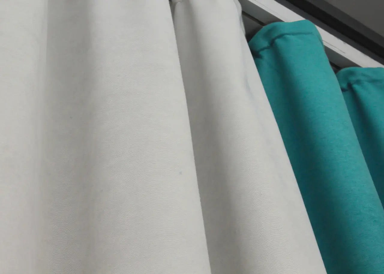 Soft luxury turquoise and light grey combined microvelvet curtains, providing comfort and style for living rooms, bedrooms, and office spaces.
