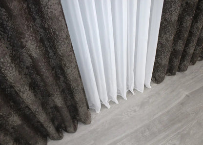 Timeless wenge and grey linen curtains with a delicate marble pattern, enhancing neutral and rich colour palettes.
