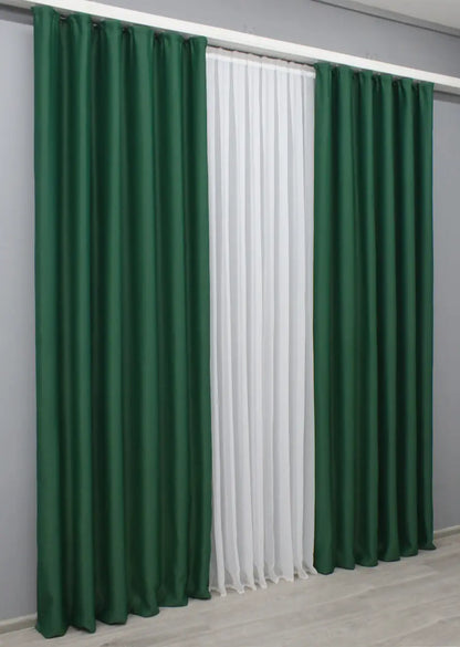 Deep sage green blackout curtains designed for luxurious and stylish homes.
