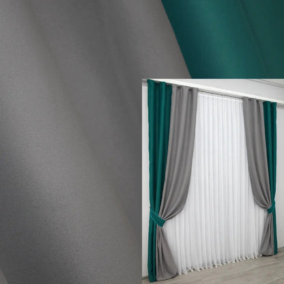 Emerald and grey combined blackout curtains with a luxurious two-tone design, perfect for modern home interiors.
