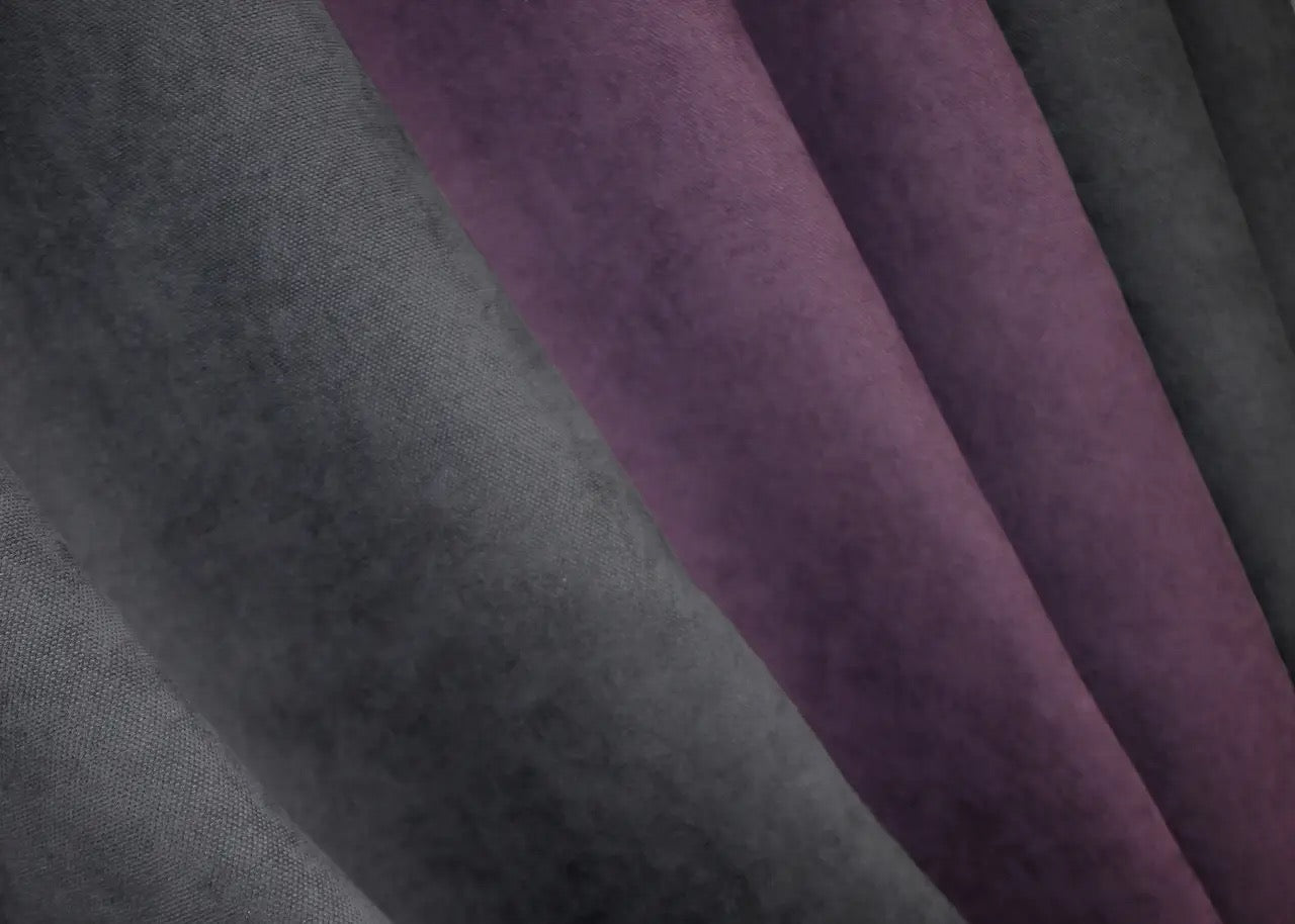 Graphite and deep plum combined microvelvet curtains, ideal for luxury interiors, offering both texture and bold design for a statement piece.
