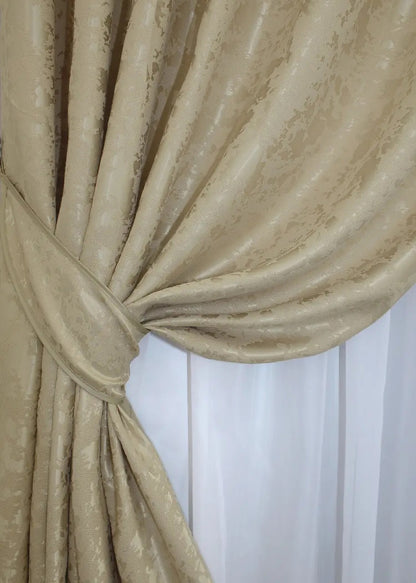 Premium beige linen drapes with a textured marble design, ideal for classic and contemporary interiors.
