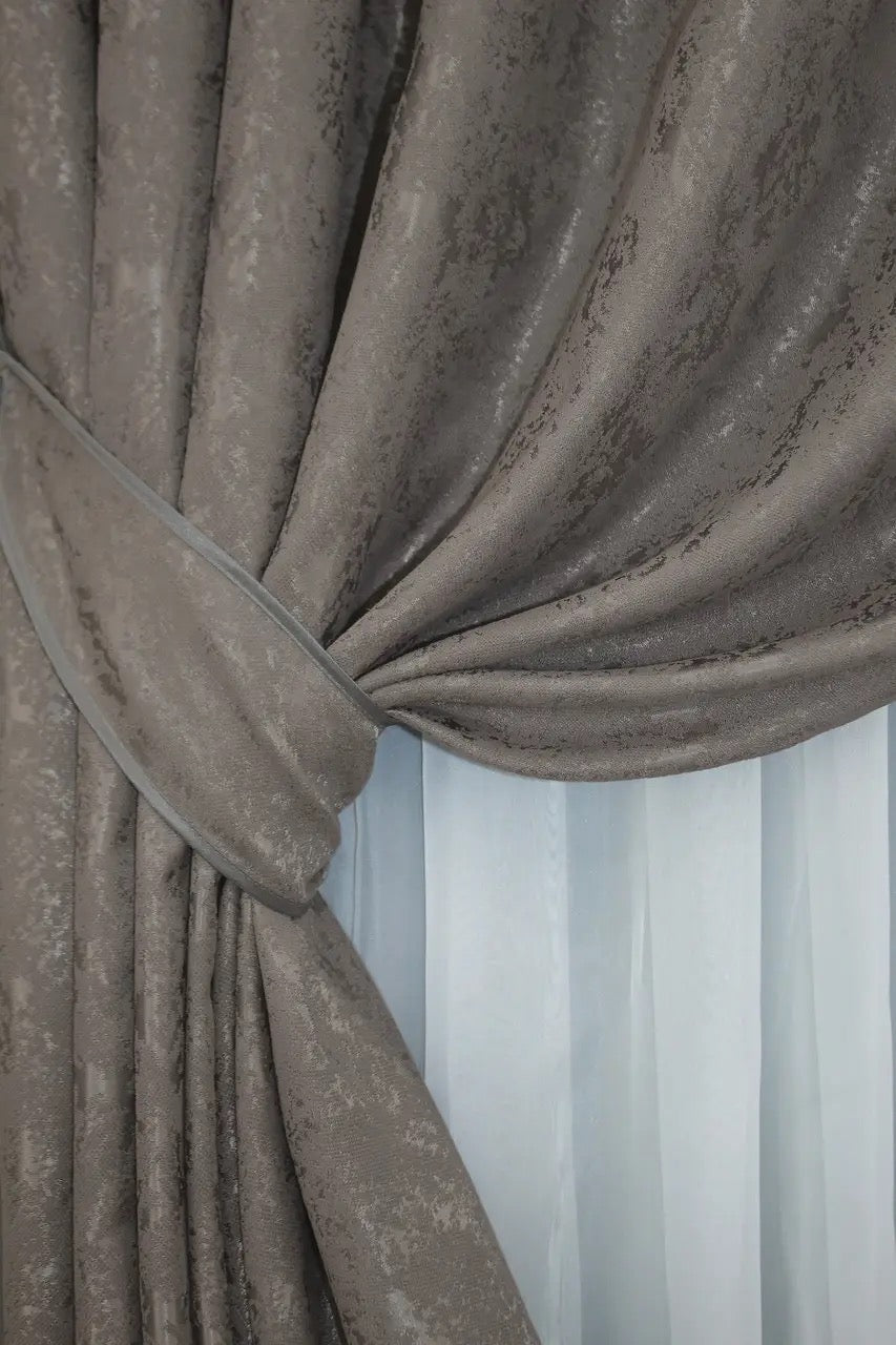 Luxury brown-grey linen curtains with a refined pattern, enhancing the warmth and comfort of any room.
