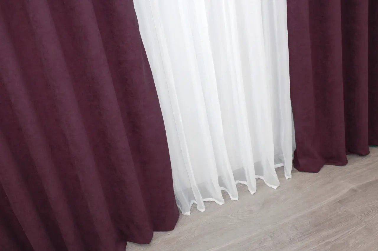 Luxury red velvet curtains with a smooth microvelvet texture, designed for living rooms and bedrooms.
