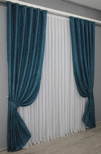 Soft deep blue linen curtains, featuring a breathable fabric that filters natural light beautifully.
