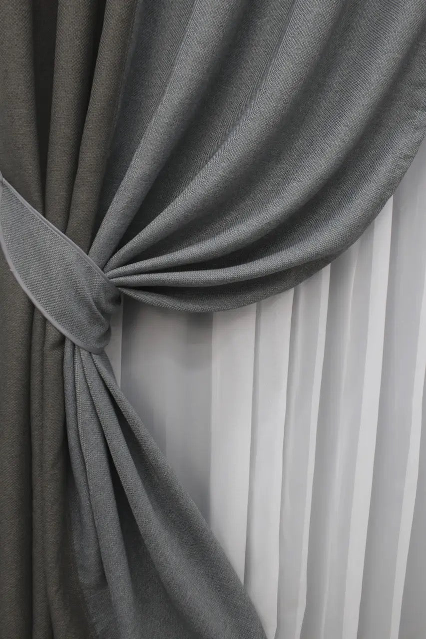 High-quality grey two-tone linen blackout curtains designed for elegant and comfortable spaces, offering privacy and light control.
