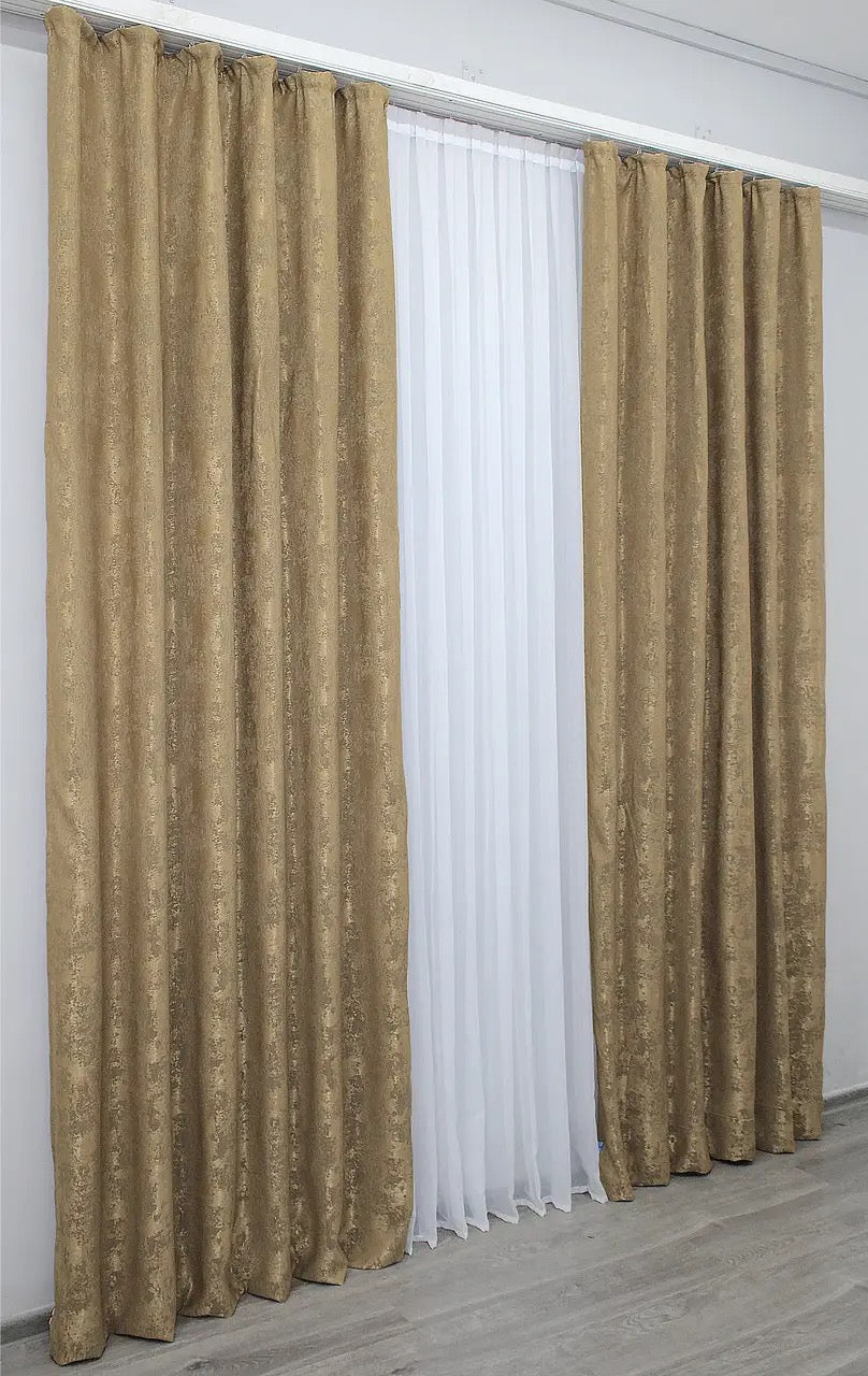 Rich honey-golden jacquard curtains with a soft woven texture, enhancing both modern and classic home interiors.
