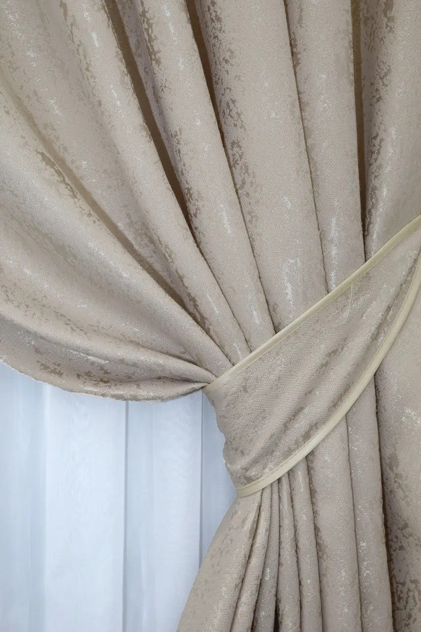 High-quality light beige linen drapes with a subtle marble design, ideal for classic and contemporary interiors.
