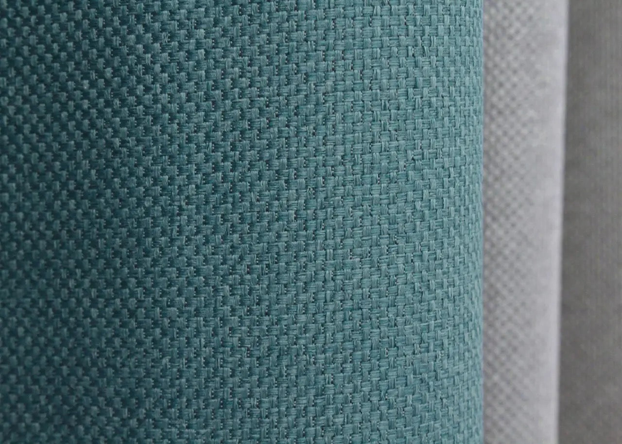 Chic light grey and turquoise linen curtains, perfect for creating a sophisticated yet inviting space with a harmonious contrast of colors.
