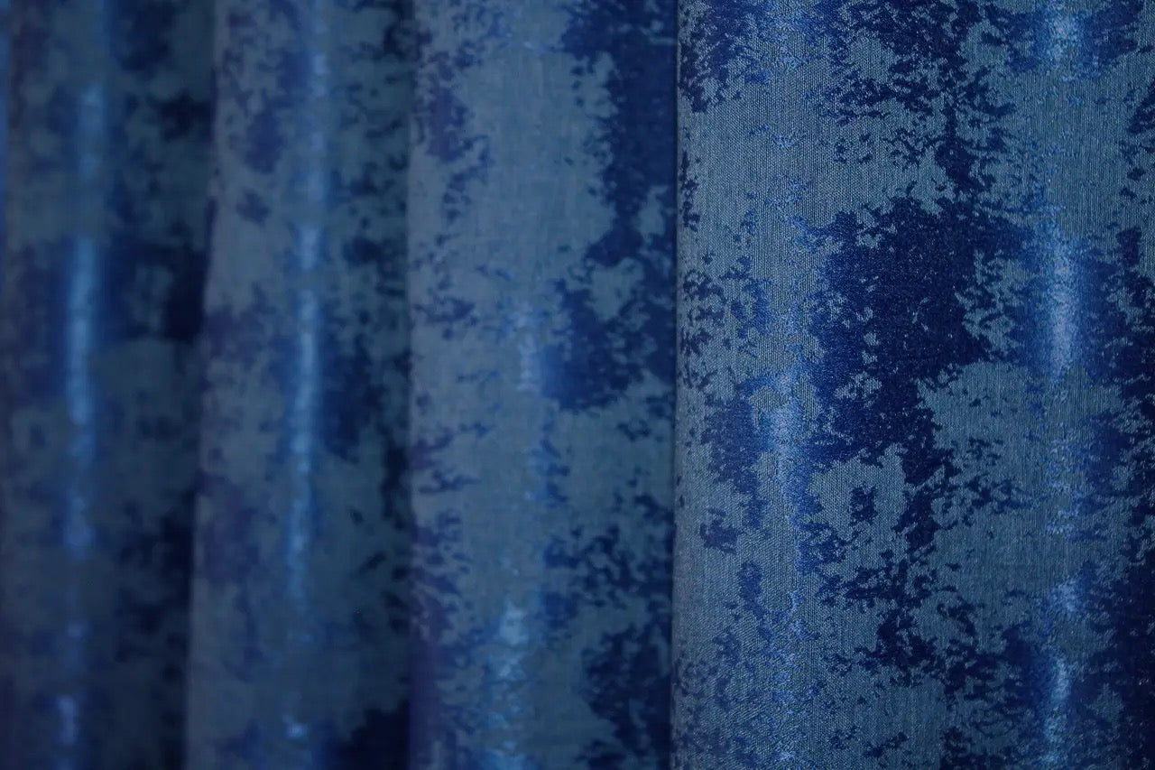 Deep Ocean Blue jacquard curtains with a soft woven texture, enhancing both modern and classic home interiors.
