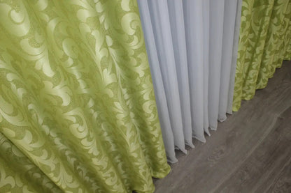 Olive green Venzel curtains with a refined decorative motif, offering charm and luxury to interiors.
