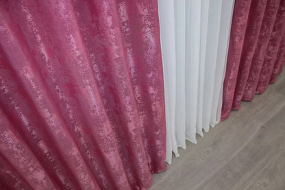 Deep raspberry jacquard curtains with a soft woven texture, enhancing both modern and classic home interiors.
