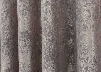 Neutral mocha jacquard curtains with a subtle sheen, seamlessly blending into a wide range of home décor styles.
