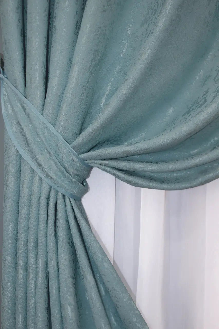 Luxury sky blue linen curtains with a refined pattern, enhancing the brightness and spaciousness of any room.
