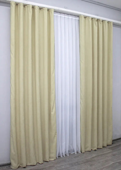 Velvety soft cream curtains with a smooth drape, enhancing both modern and classic interiors.
