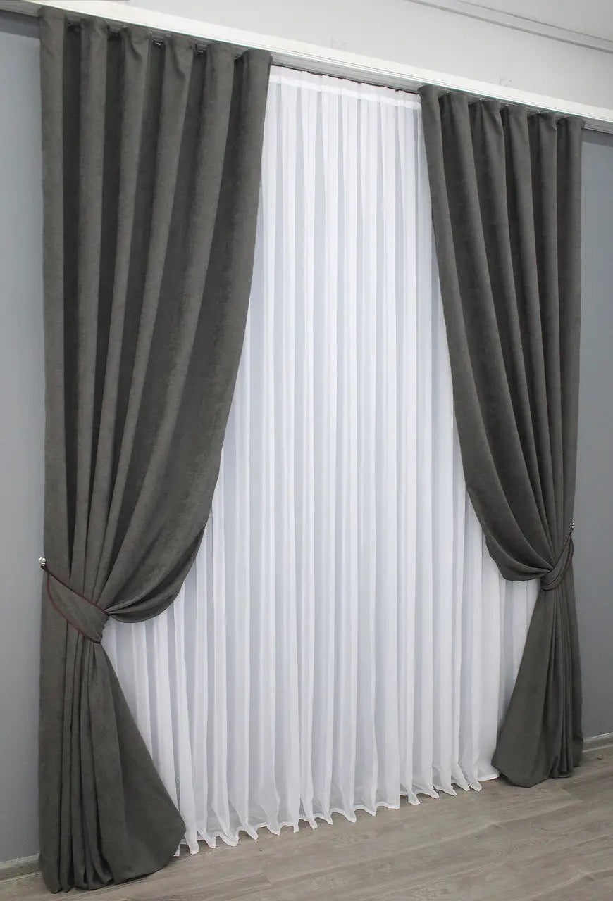 High-quality  microvelvet curtains in dark grey, designed for stylish home décor and privacy.
