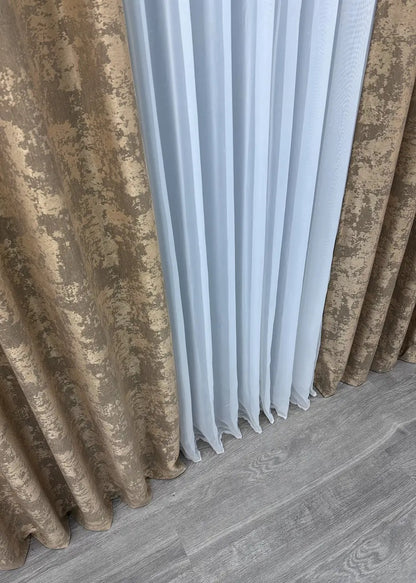 Rich pecan brown jacquard curtains with a sophisticated weave, adding warmth and depth to any space.
