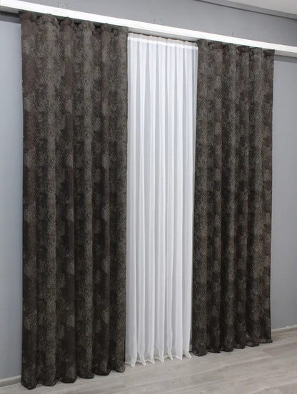 Light-filtering wenge and grey linen curtains with a marble design, adding warmth and depth to any room.
