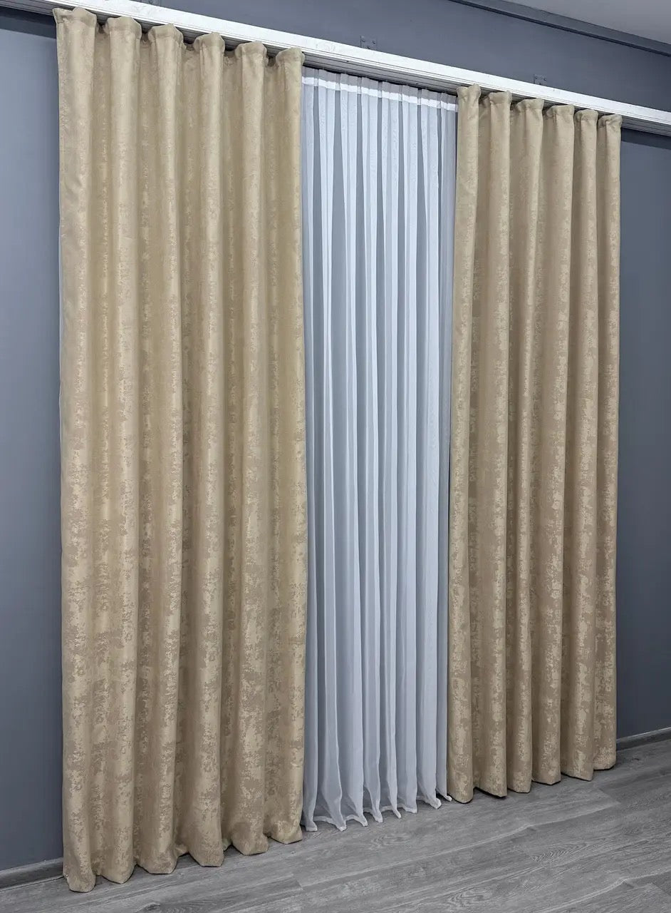 Set of 2 beige jacquard curtain panels, designed to create a soft, inviting atmosphere while maintaining privacy.