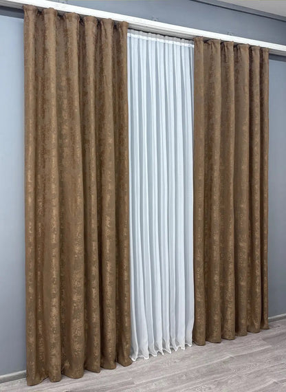 Set of 2 light brown jacquard curtain panels, designed to create a warm and inviting atmosphere while maintaining privacy.