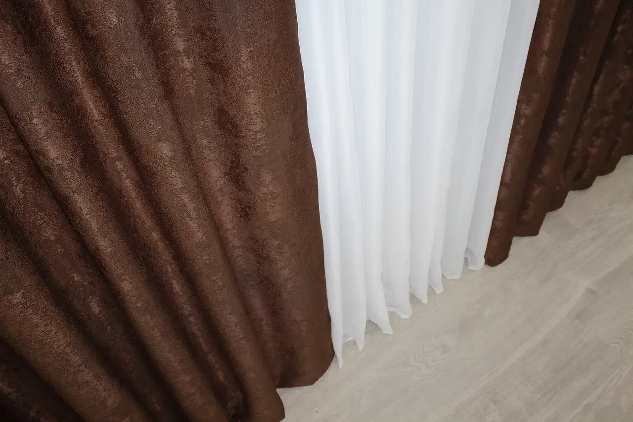 High-quality brown-burgundy curtains made from premium jacquard fabric, enhancing both modern and classic home interiors.
