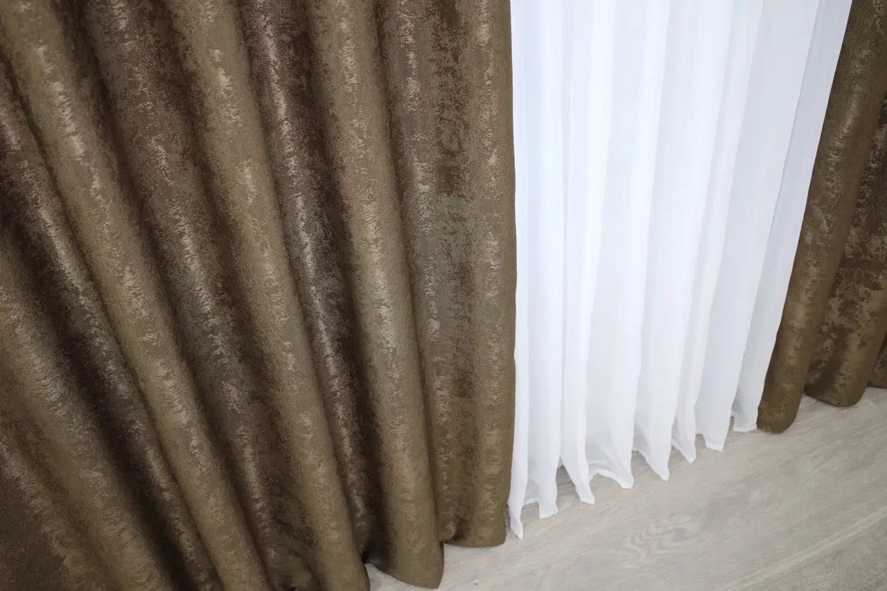 High-quality brown curtains made from premium jacquard fabric, complementing both modern and traditional home interiors.
