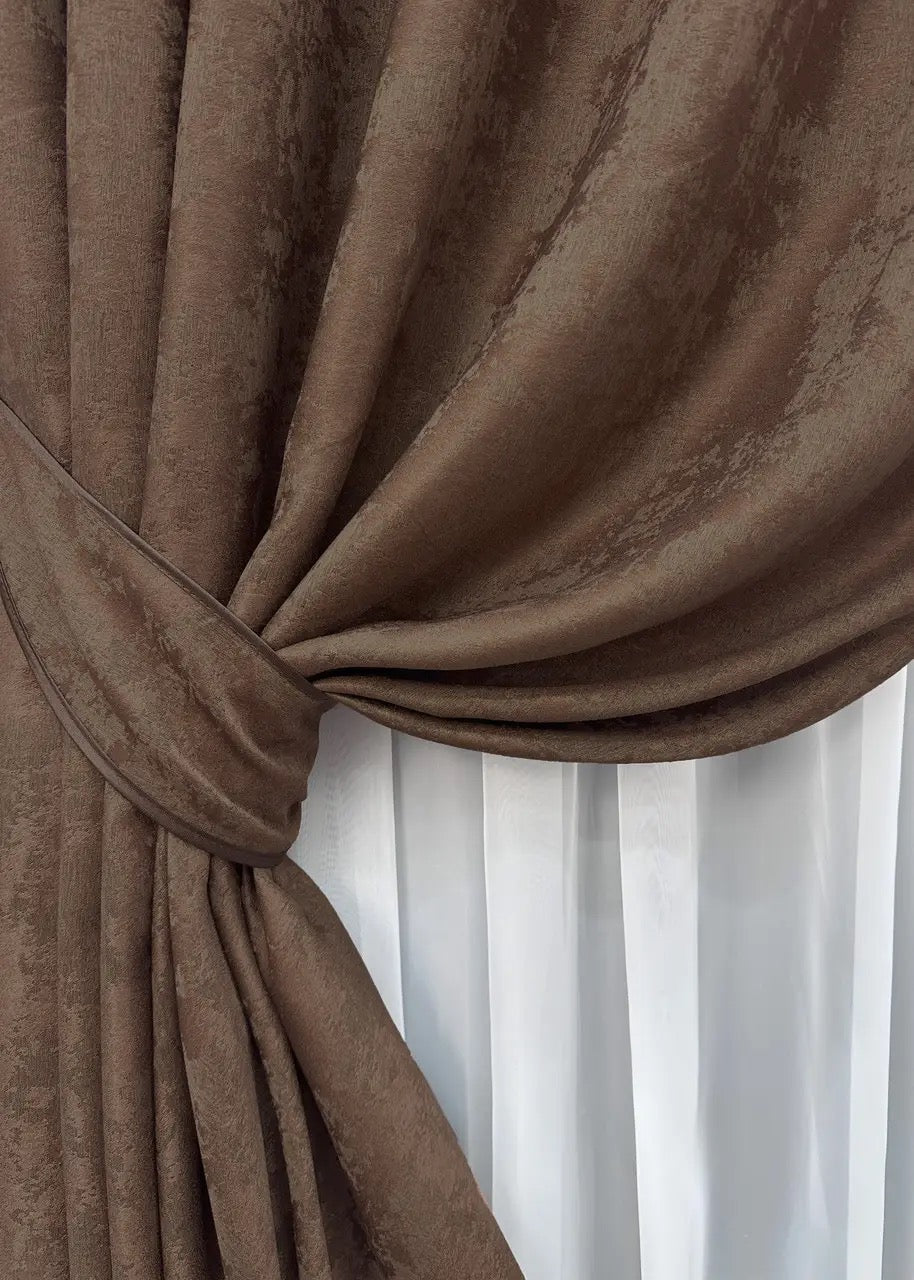 High-quality jacquard curtains in brown, blocking 70% of light while enhancing the ambiance of any space.
