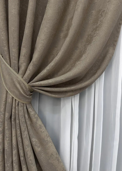 High-quality jacquard curtains in cocoa brown, blocking 70% of light while enhancing the ambiance of any space.
