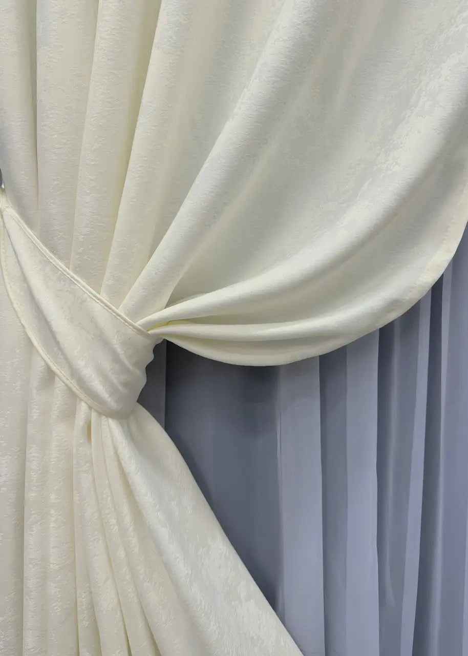 High-quality jacquard curtains in cream, blocking 70% of light while enhancing the ambiance of any space.
