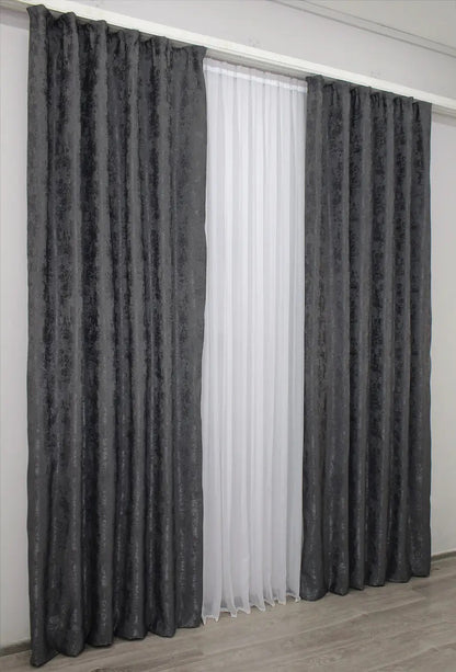 High-quality graphite dark grey curtains made from premium jacquard fabric, complementing both modern and traditional home interiors.
