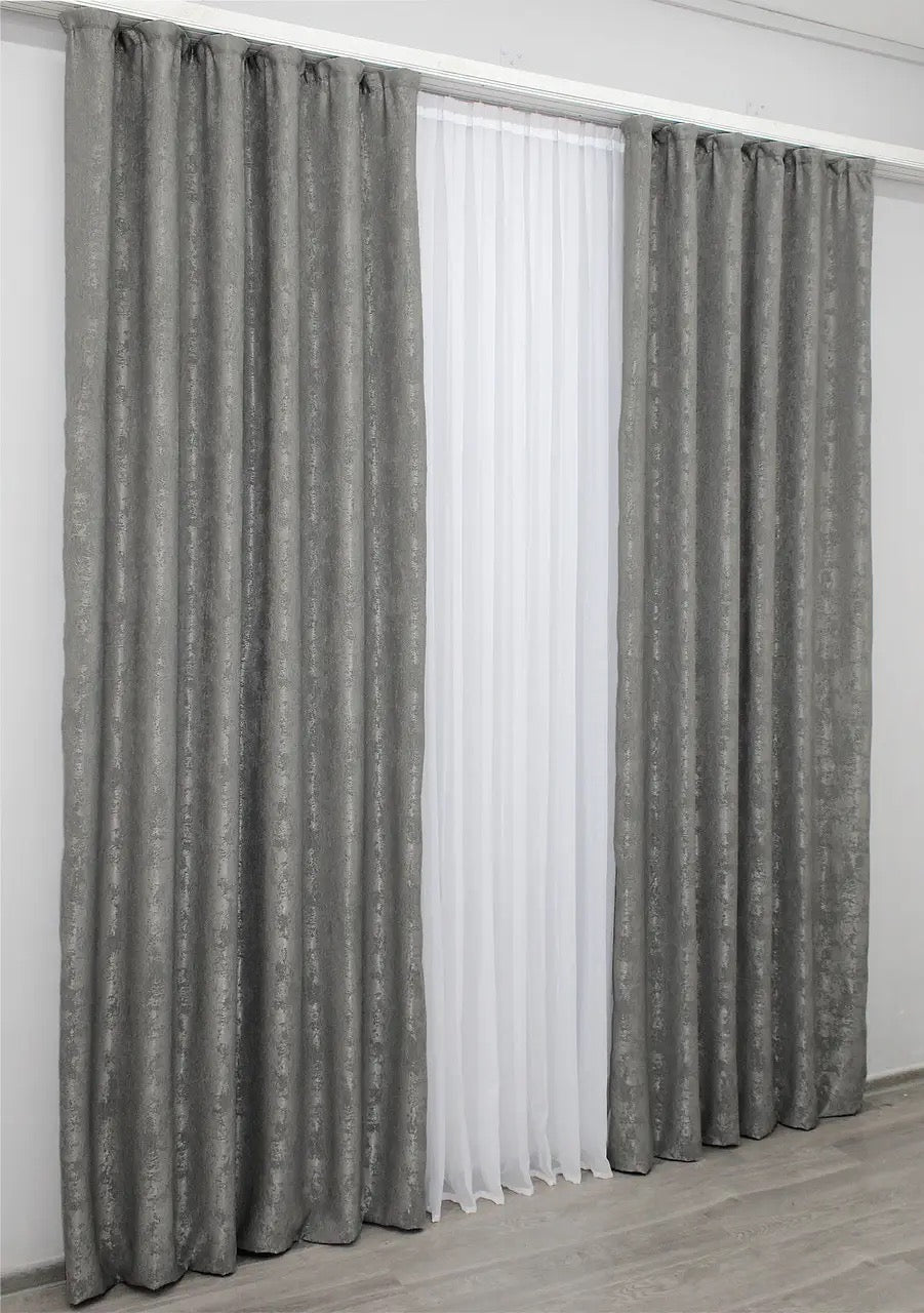 High-quality grey curtains made from premium jacquard fabric, complementing modern and traditional home interiors.
