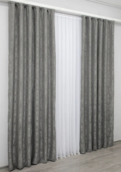 High-quality grey curtains made from premium jacquard fabric, complementing modern and traditional home interiors.
