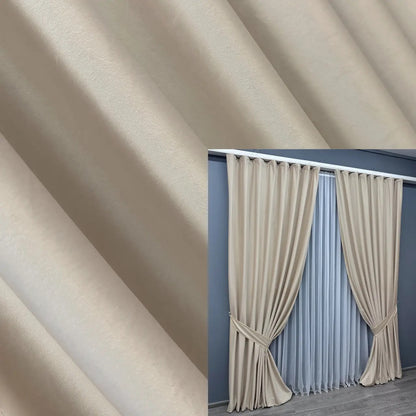 Luxurious light beige velvet curtains with a soft, rich texture, perfect for creating a sophisticated home décor.
