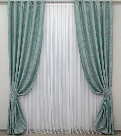 Luxury muted teal jacquard curtains with a delicate sheen, perfect for modern and classic interiors.
