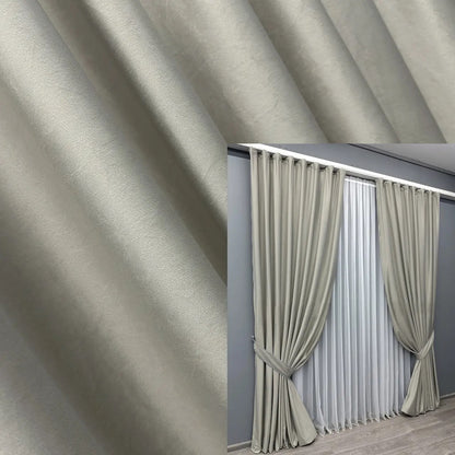 Luxurious satin velvet curtains in an elegant champagne shade, featuring a soft plush texture for blackout and noise reduction in living rooms and bedrooms.
