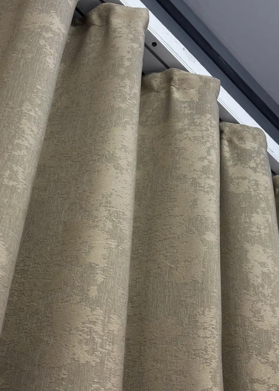 Luxurious warm cocoa brown jacquard curtains with an elegant fabric weave, adding depth to any space.
