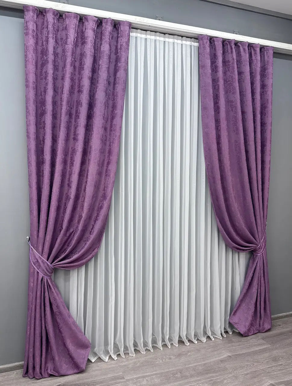 Stylish violet curtains designed with a subtle, calming tone, ideal for both contemporary and classic interior styles.
