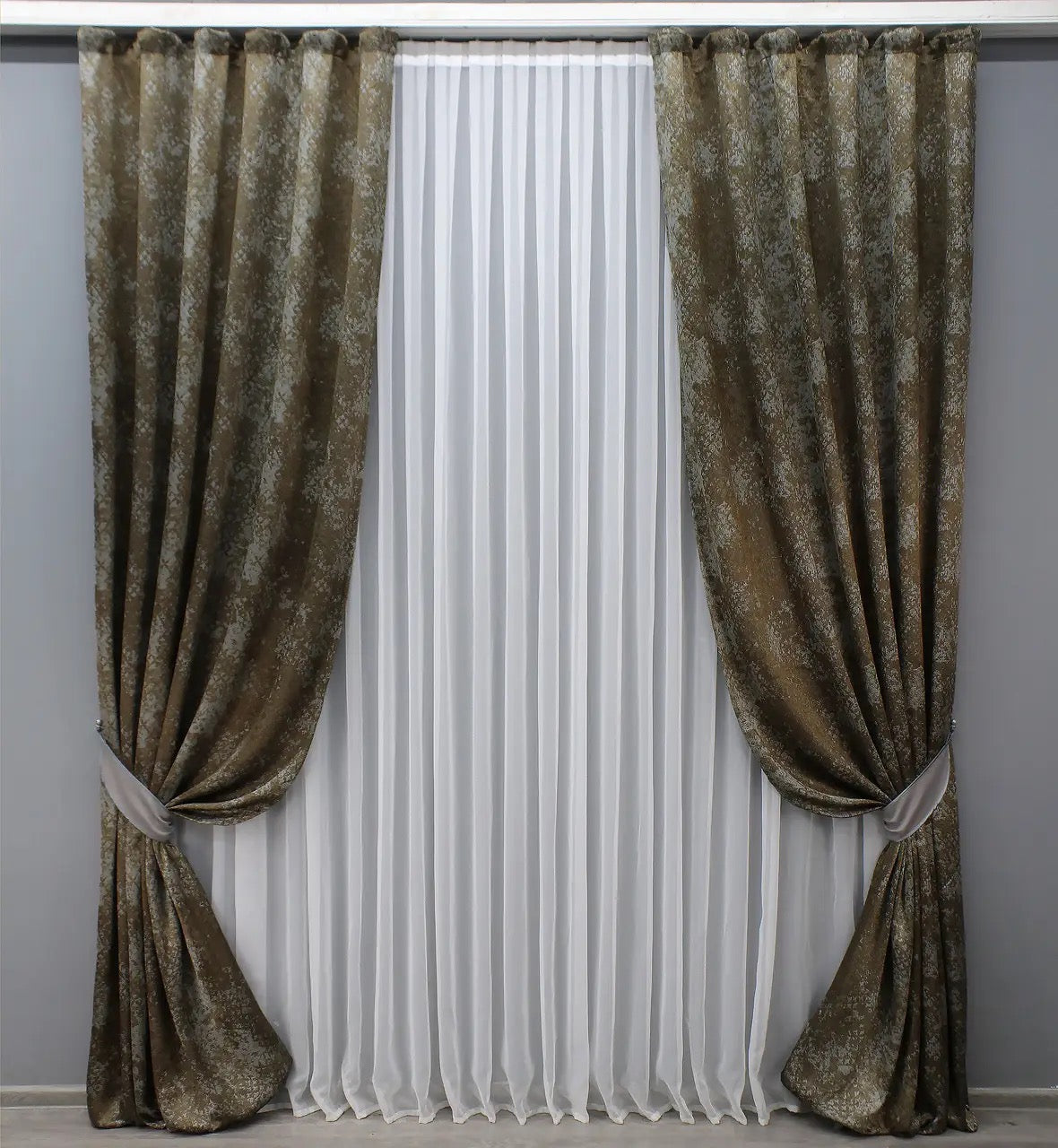 Luxury brown and grey linen drapes featuring a refined textured marble effect for sophisticated home décor.
