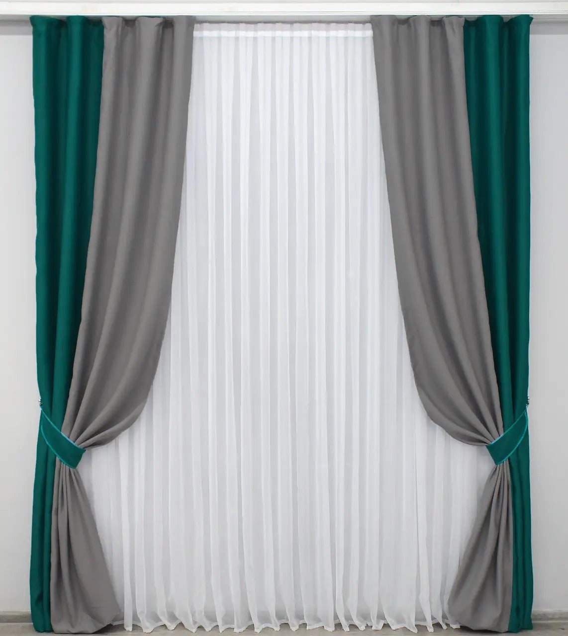 Elegant emerald and grey combined blackout curtains offering a sophisticated look for bedrooms and living rooms.
