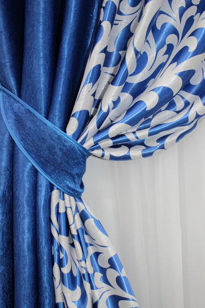 Stylish two-tone blue and grey combined curtains with excellent light-blocking properties and a chic floral pattern.
