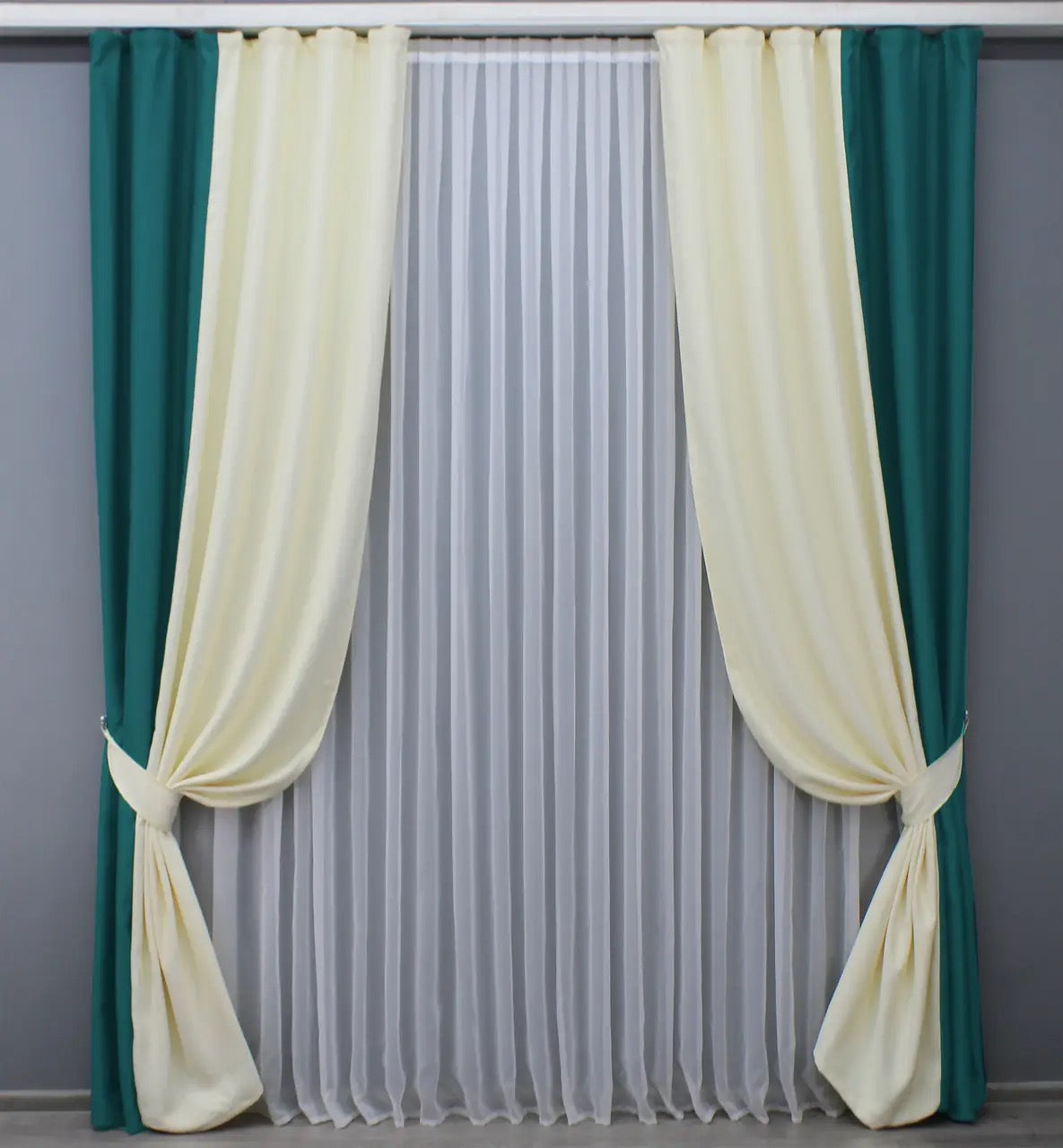 Premium emerald green and soft cream combined blackout curtains, providing superior privacy and a stylish, modern contrast.
