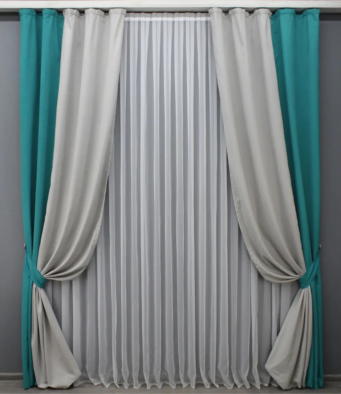 Premium turquoise and light grey microvelvet curtains, perfect for creating a calm and cozy ambiance while adding modern elegance to any space.
