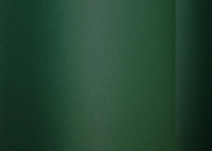 Luxury dark green blackout curtains, perfect for creating a sophisticated space.
