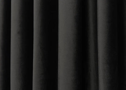 Midnight black velvet blackout drapes, ideal for luxurious and stylish window treatments.
